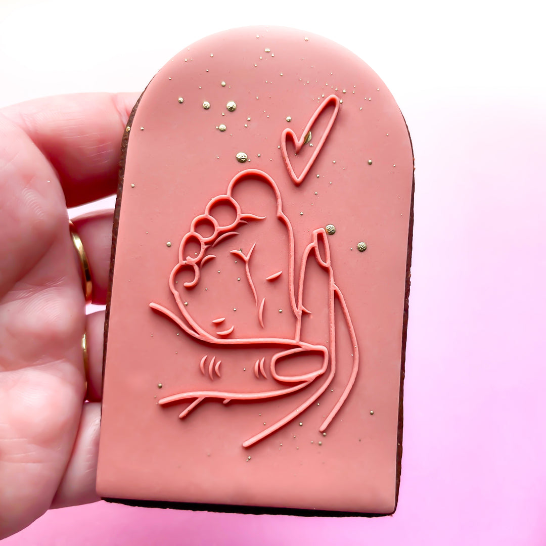 Hand Holding Little Baby Foot